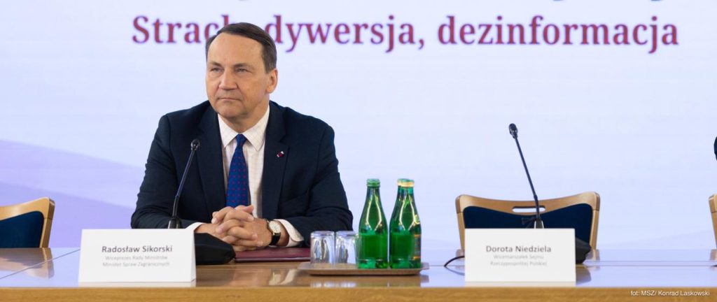 Here is a formal revision of the title:
Participation of Minister of Foreign Affairs Radosław Sikorski in the “The War for Minds: Fear, Subversion, Disinformation” Conference at the Sejm
