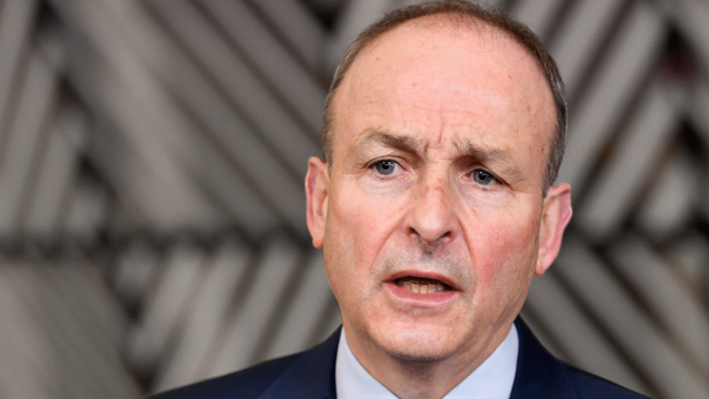 Here are a few options, depending on the desired level of formality:
Taoiseach signals willingness to review free speech impact of misinformation regulations. (Most precise)
Taoiseach considers assessment of misinformation legislation regarding free speech implications. (Most formal)
Taoiseach open to evaluating impact of misinformation rules on freedom of expression. (Most balanced)