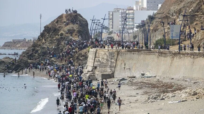 Here are a few ways to rewrite the title in a formal tone, depending on the desired emphasis:
Option 1 (Direct and standard): Morocco Attributes Surge in Ceuta Migrations to Misinformation
Option 2 (More formal/diplomatic): Moroccan Authorities Cite Misinformation as Primary Driver of Ceuta Migrant Surge
Option 3 (Concise): Morocco Denounces Misinformation in Wake of Ceuta Migration Influx
Recommendation: Option 2 is the most appropriate for a formal news or academic context.